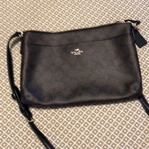 Crossbody in Coach signature pattern.